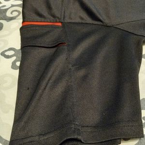 Four American Exchange Men's collar shirts. Two with zippers. Size Medium.